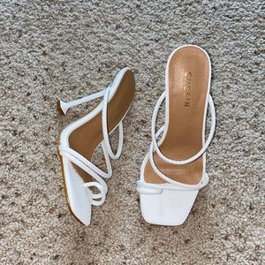 Never worn // white heels with toe/foot straps!